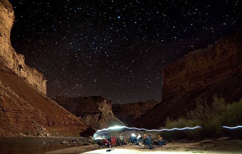A timelapse shot of the starry sky above the colorado river